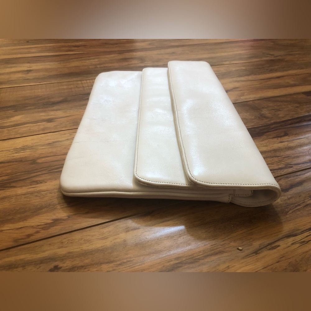 Vintage Jane Barry 3-tiered cream colored clutch